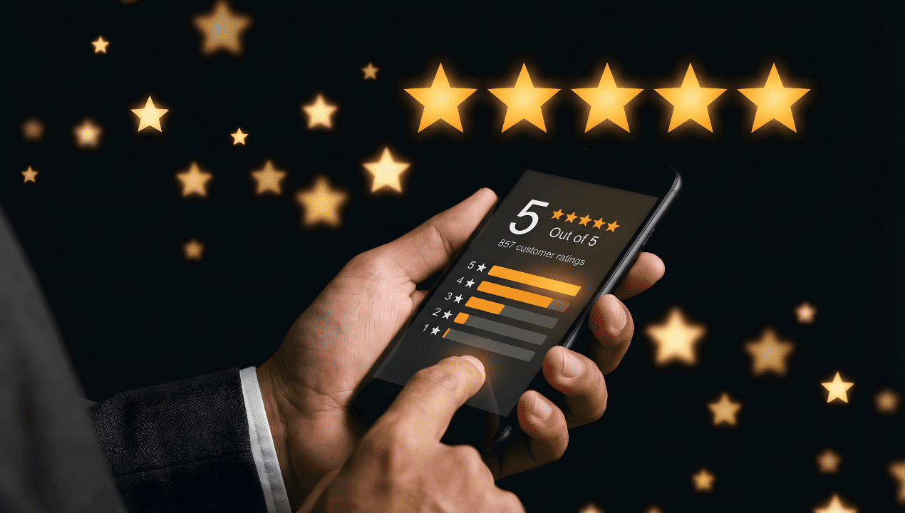 Hands holding a smartphone displaying customer ratings beneath five glowing gold stars